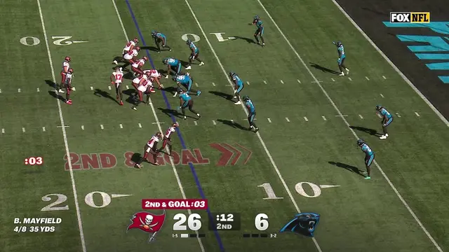 Baker Mayfield escapes the pocket and throws for the tD