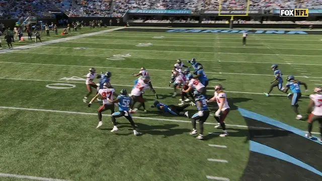 Sean Tucker breaks free for a touchdown